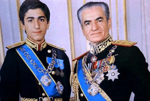 His Majesty, the Shah of Iran, and others in dark military uniforms with blue sashes and medals pose for a formal portrait — a public domain photograph from The Shah of Iran archive documenting the Pahlavi era.
